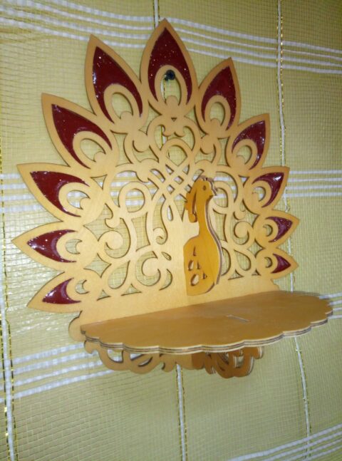 Laser Cut Peacock Shelf Free Vector