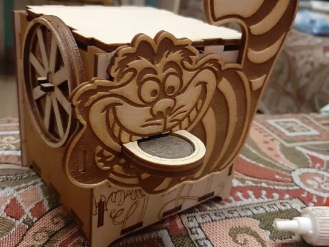 Laser Cut Amazing Coin Saving Piggy Bank Free Vector