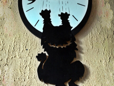 Laser Cut Insolent Cat Wall Clock Free Vector