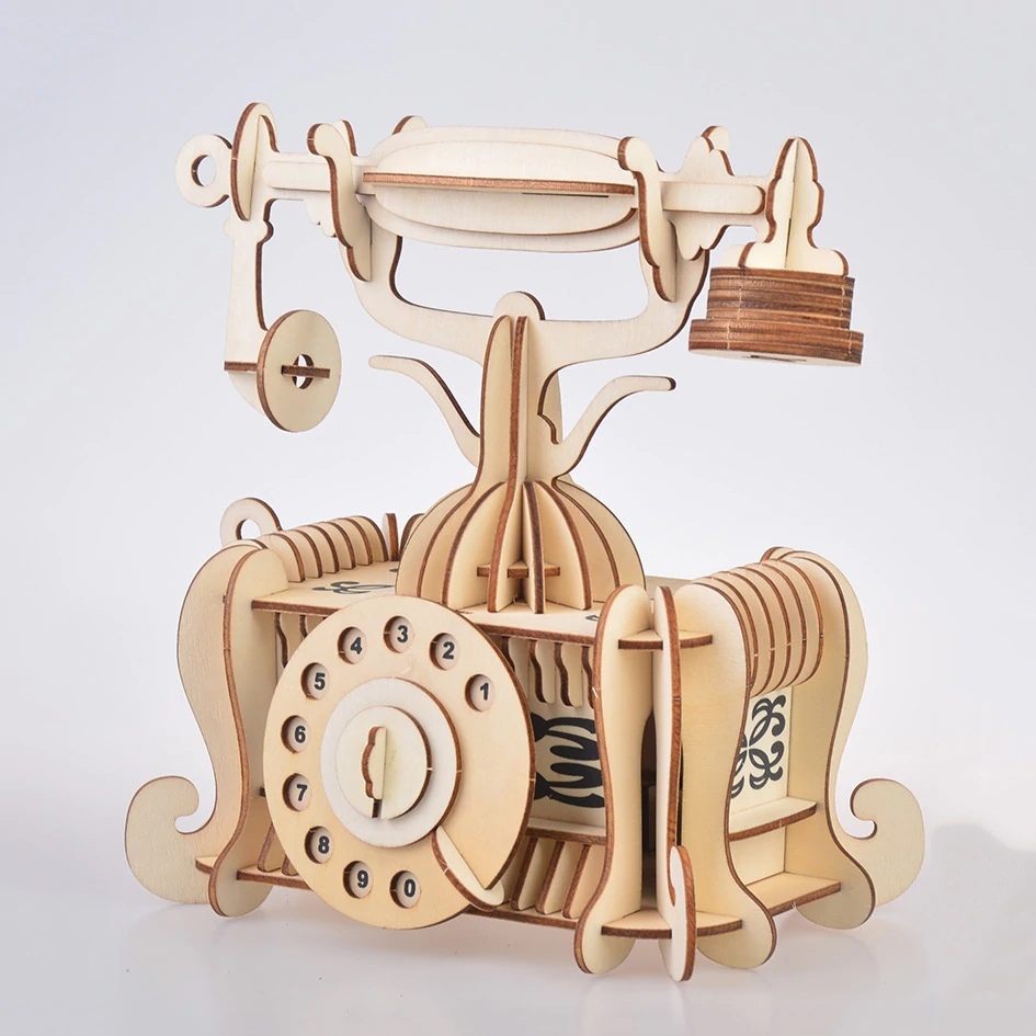 Laser Cut Old-fashioned Telephone Toy 3D Wooden Model Free Vector