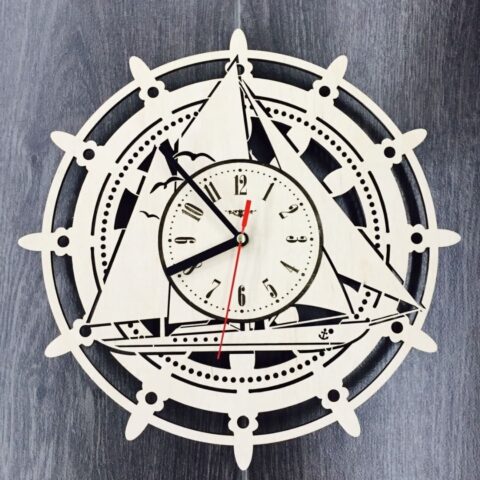 Laser Cut Wall Clock with Sailboat Free Vector