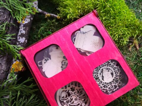 Laser Cut Christmas Box with Ornaments Free Vector