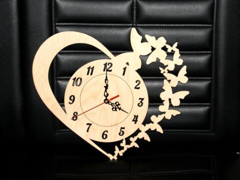 Laser Cut Clock with Heart and Butterflies Free Vector