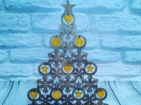 Laser Cut Christmas Tree made of Snowflakes Free Vector